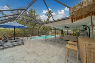 Under contract-accepting backup offers. Stunning Modern Pool on Clearwater Country Club in Florida - for sale on GolfHomes.com, golf home, golf lot