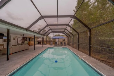Under contract-accepting backup offers. Stunning Modern Pool on Clearwater Country Club in Florida - for sale on GolfHomes.com, golf home, golf lot