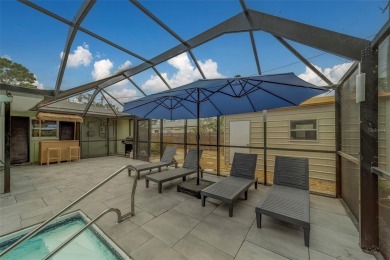 Under contract-accepting backup offers. Stunning Modern Pool on Clearwater Country Club in Florida - for sale on GolfHomes.com, golf home, golf lot