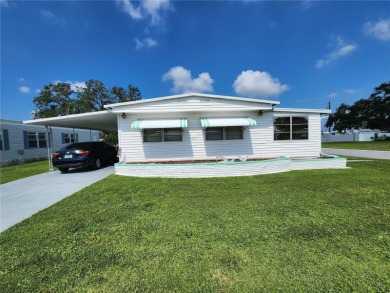 NEW ROOF 10/24.  Charming Corner Lot Home located in Heather on Heather Hills Golf Course in Florida - for sale on GolfHomes.com, golf home, golf lot