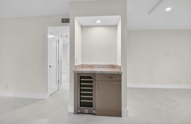 A new renovation of the most desirable model, this FIRST FLOOR on Gleneagles Golf and Country Club in Florida - for sale on GolfHomes.com, golf home, golf lot