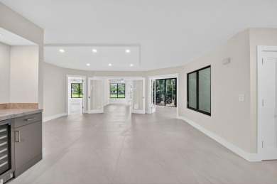 A new renovation of the most desirable model, this FIRST FLOOR on Gleneagles Golf and Country Club in Florida - for sale on GolfHomes.com, golf home, golf lot