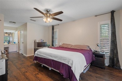Under contract-accepting backup offers. Charming 3-Bedroom on Oak Hills Country Club in Florida - for sale on GolfHomes.com, golf home, golf lot