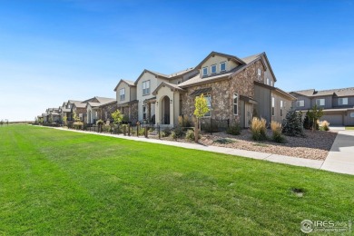 This beautifully crafted, Italian-inspired end unit luxury on Highland Meadows Golf Course in Colorado - for sale on GolfHomes.com, golf home, golf lot