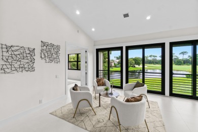 With a spectacular picture-perfect view of the lake and golf on Polo Club of Boca Raton in Florida - for sale on GolfHomes.com, golf home, golf lot