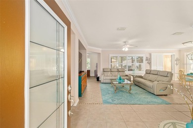 This bright and spacious Captiva model is now available in on Eagle Ridge At Spruce Creek Country Club in Florida - for sale on GolfHomes.com, golf home, golf lot