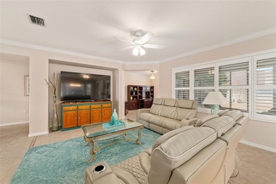This bright and spacious Captiva model is now available in on Eagle Ridge At Spruce Creek Country Club in Florida - for sale on GolfHomes.com, golf home, golf lot