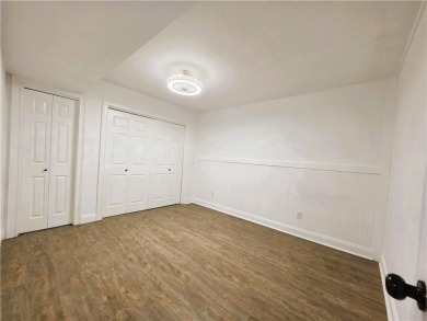 Nestled close to Dogwood Golf Course, this lovely end unit on Bella Vista Country Club and Golf Course in Arkansas - for sale on GolfHomes.com, golf home, golf lot
