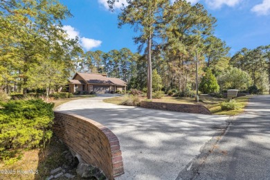 Beautiful custom-built coastal retreat that offers rare privacy on Carolina Shores Golf Course in North Carolina - for sale on GolfHomes.com, golf home, golf lot