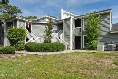Welcome to this updated 2-bedroom, 2-bathroom ground floor condo on Belvedere Country Club in North Carolina - for sale on GolfHomes.com, golf home, golf lot