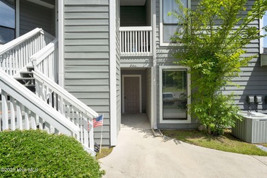 Welcome to this updated 2-bedroom, 2-bathroom ground floor condo on Belvedere Country Club in North Carolina - for sale on GolfHomes.com, golf home, golf lot