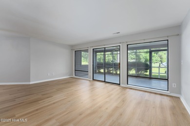 Welcome to this updated 2-bedroom, 2-bathroom ground floor condo on Belvedere Country Club in North Carolina - for sale on GolfHomes.com, golf home, golf lot
