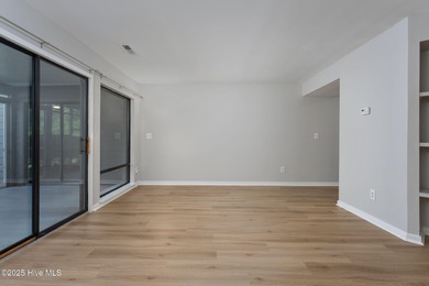 Welcome to this updated 2-bedroom, 2-bathroom ground floor condo on Belvedere Country Club in North Carolina - for sale on GolfHomes.com, golf home, golf lot