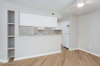 Welcome to this updated 2-bedroom, 2-bathroom ground floor condo on Belvedere Country Club in North Carolina - for sale on GolfHomes.com, golf home, golf lot