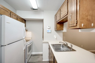 This charming 2-bedroom, 1-bathroom townhouse offers comfortable on Forest Hills Golf Club in Georgia - for sale on GolfHomes.com, golf home, golf lot