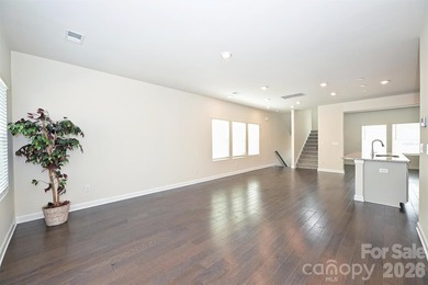 This elegant three story end-unit townhome located at City Park on Renaissance Park Golf Course in North Carolina - for sale on GolfHomes.com, golf home, golf lot