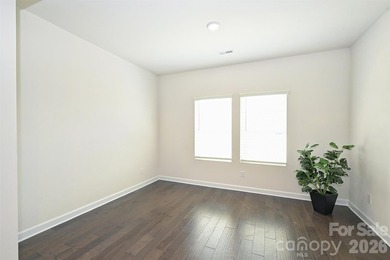 This elegant three story end-unit townhome located at City Park on Renaissance Park Golf Course in North Carolina - for sale on GolfHomes.com, golf home, golf lot