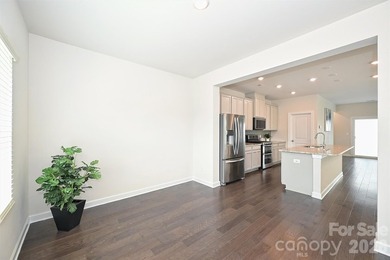 This elegant three story end-unit townhome located at City Park on Renaissance Park Golf Course in North Carolina - for sale on GolfHomes.com, golf home, golf lot