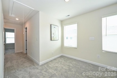 This elegant three story end-unit townhome located at City Park on Renaissance Park Golf Course in North Carolina - for sale on GolfHomes.com, golf home, golf lot