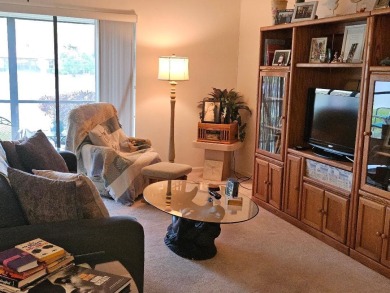 Relisted with Price Improvement! BEAUTIFUL LONG LAKE VIEW! on Champions Club at Summerfield in Florida - for sale on GolfHomes.com, golf home, golf lot