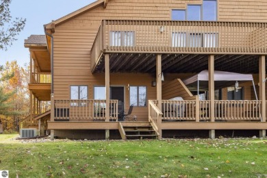 Vista Del Verde #4 is a peaceful corner condo that overlooks the on Schuss Mountain Golf Club in Michigan - for sale on GolfHomes.com, golf home, golf lot