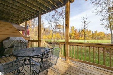 Vista Del Verde #4 is a peaceful corner condo that overlooks the on Schuss Mountain Golf Club in Michigan - for sale on GolfHomes.com, golf home, golf lot