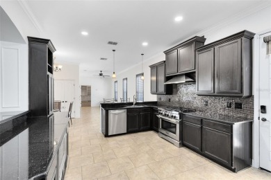 Welcome to your private retreat in the heart of Wedgefield, FL! on Wedgefield Golf Club in Florida - for sale on GolfHomes.com, golf home, golf lot