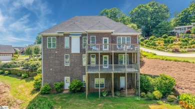 Welcome to 9 Belle Terre Court, where elegance meets tranquility on Summersett Golf Club in South Carolina - for sale on GolfHomes.com, golf home, golf lot