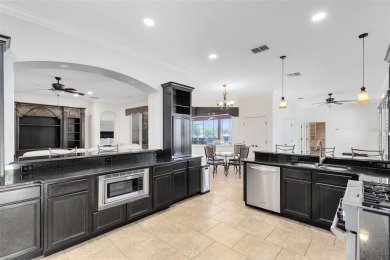 Welcome to your private retreat in the heart of Wedgefield, FL! on Wedgefield Golf Club in Florida - for sale on GolfHomes.com, golf home, golf lot