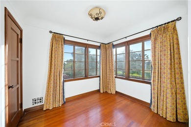 Discover a Mediterranean masterpiece in the heart of Alamitos on Recreation Park Golf Course 18 in California - for sale on GolfHomes.com, golf home, golf lot