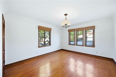 Discover a Mediterranean masterpiece in the heart of Alamitos on Recreation Park Golf Course 18 in California - for sale on GolfHomes.com, golf home, golf lot