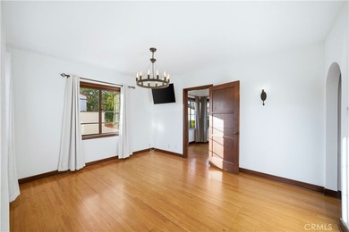 Discover a Mediterranean masterpiece in the heart of Alamitos on Recreation Park Golf Course 18 in California - for sale on GolfHomes.com, golf home, golf lot