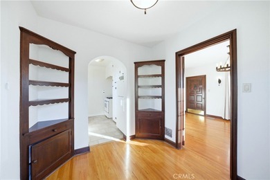 Discover a Mediterranean masterpiece in the heart of Alamitos on Recreation Park Golf Course 18 in California - for sale on GolfHomes.com, golf home, golf lot