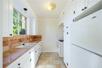 Discover a Mediterranean masterpiece in the heart of Alamitos on Recreation Park Golf Course 18 in California - for sale on GolfHomes.com, golf home, golf lot