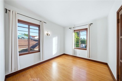 Discover a Mediterranean masterpiece in the heart of Alamitos on Recreation Park Golf Course 18 in California - for sale on GolfHomes.com, golf home, golf lot