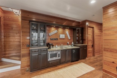 Commandingly sited within the prestigious Wade Hampton Golf Club on Headwaters Golf Club in North Carolina - for sale on GolfHomes.com, golf home, golf lot