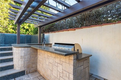 Discover a Mediterranean masterpiece in the heart of Alamitos on Recreation Park Golf Course 18 in California - for sale on GolfHomes.com, golf home, golf lot