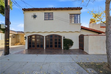 Discover a Mediterranean masterpiece in the heart of Alamitos on Recreation Park Golf Course 18 in California - for sale on GolfHomes.com, golf home, golf lot