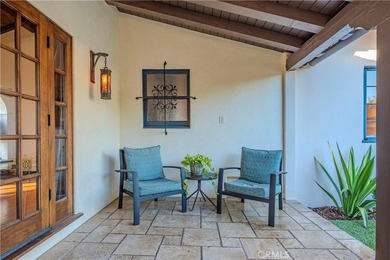 Discover a Mediterranean masterpiece in the heart of Alamitos on Recreation Park Golf Course 18 in California - for sale on GolfHomes.com, golf home, golf lot