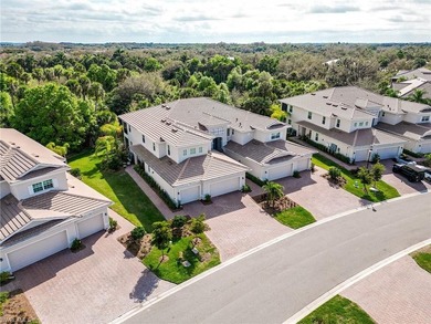 Discover this stunning first-floor coach home in the gated on Verandah Golf Course and Club in Florida - for sale on GolfHomes.com, golf home, golf lot