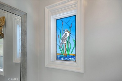 Discover a Mediterranean masterpiece in the heart of Alamitos on Recreation Park Golf Course 18 in California - for sale on GolfHomes.com, golf home, golf lot