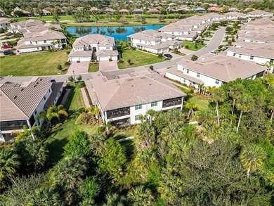Discover this stunning first-floor coach home in the gated on Verandah Golf Course and Club in Florida - for sale on GolfHomes.com, golf home, golf lot