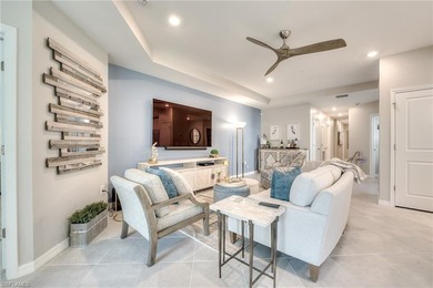 Discover this stunning first-floor coach home in the gated on Verandah Golf Course and Club in Florida - for sale on GolfHomes.com, golf home, golf lot