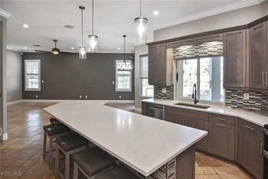 This beautiful Manchester Grand is officially on the market-and on Heritage Palms Golf and Country Club in Florida - for sale on GolfHomes.com, golf home, golf lot