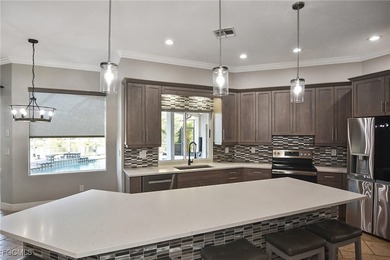 This beautiful Manchester Grand is officially on the market-and on Heritage Palms Golf and Country Club in Florida - for sale on GolfHomes.com, golf home, golf lot