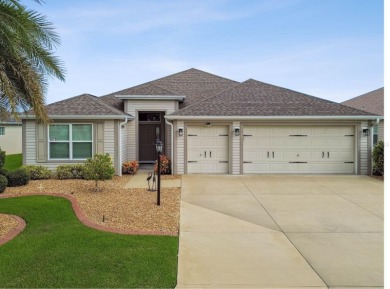 Beautifully maintained 3-bedroom, 2-bath Designer Home with a on Bella Glade Country Club in Florida - for sale on GolfHomes.com, golf home, golf lot