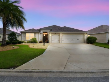 Beautifully maintained 3-bedroom, 2-bath Designer Home with a on Bella Glade Country Club in Florida - for sale on GolfHomes.com, golf home, golf lot
