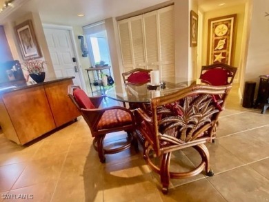 Inviting tropical oasis meets updated first floor convenience on The Landings Yacht, Golf and Tennis Club in Florida - for sale on GolfHomes.com, golf home, golf lot