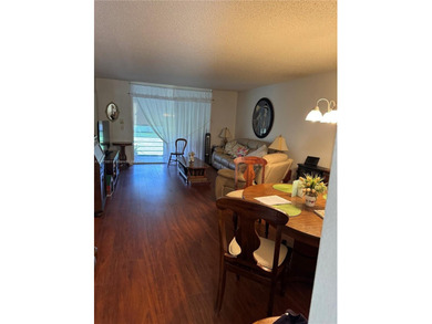 Beautiful and spacious 2BR/2BA condo in the prestigious 55+ on Sunrise Lakes Phase III in Florida - for sale on GolfHomes.com, golf home, golf lot