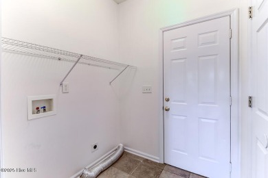 Discover this beautifully maintained 3-bedroom, 2-bathroom home on Belvedere Country Club in North Carolina - for sale on GolfHomes.com, golf home, golf lot